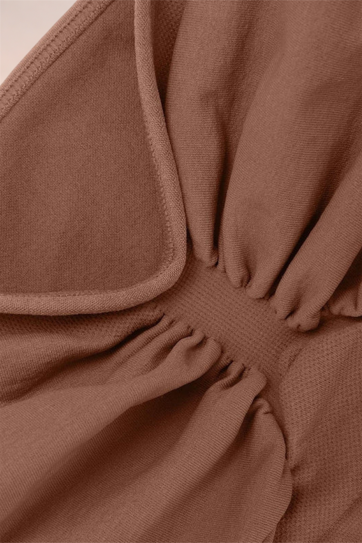 Close-up of the ruched gathering on the Skinzform Soutien Bra in Tan