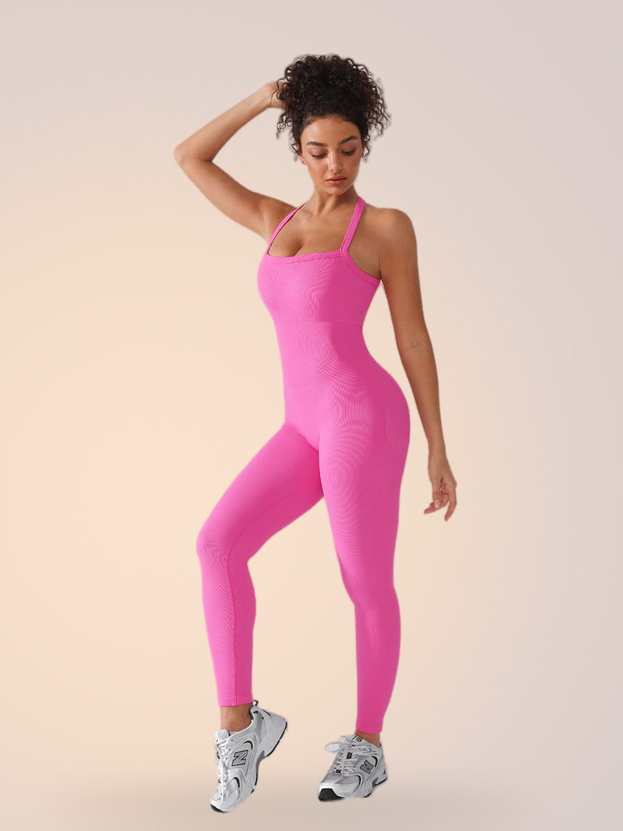 Skinzform Sport Jumpsuit in Rose, side view - full-length fit worn with trainers